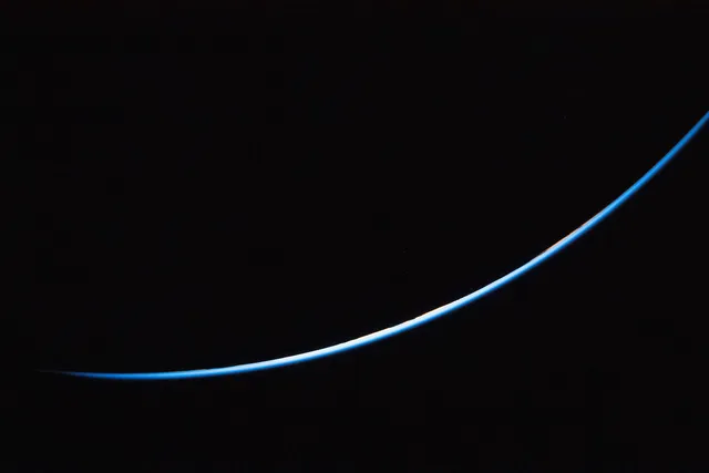 Artemis wallpaper: A Sliver of Earth